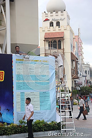 installing outdoor advertising in shenzhenï¼Œchinaï¼ŒAsia Editorial Stock Photo